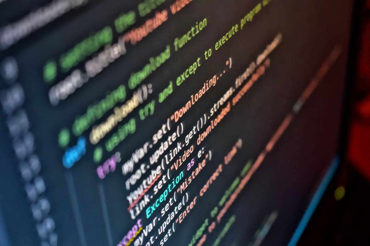 a dusty vintage computer monitor displaying a syntax error code