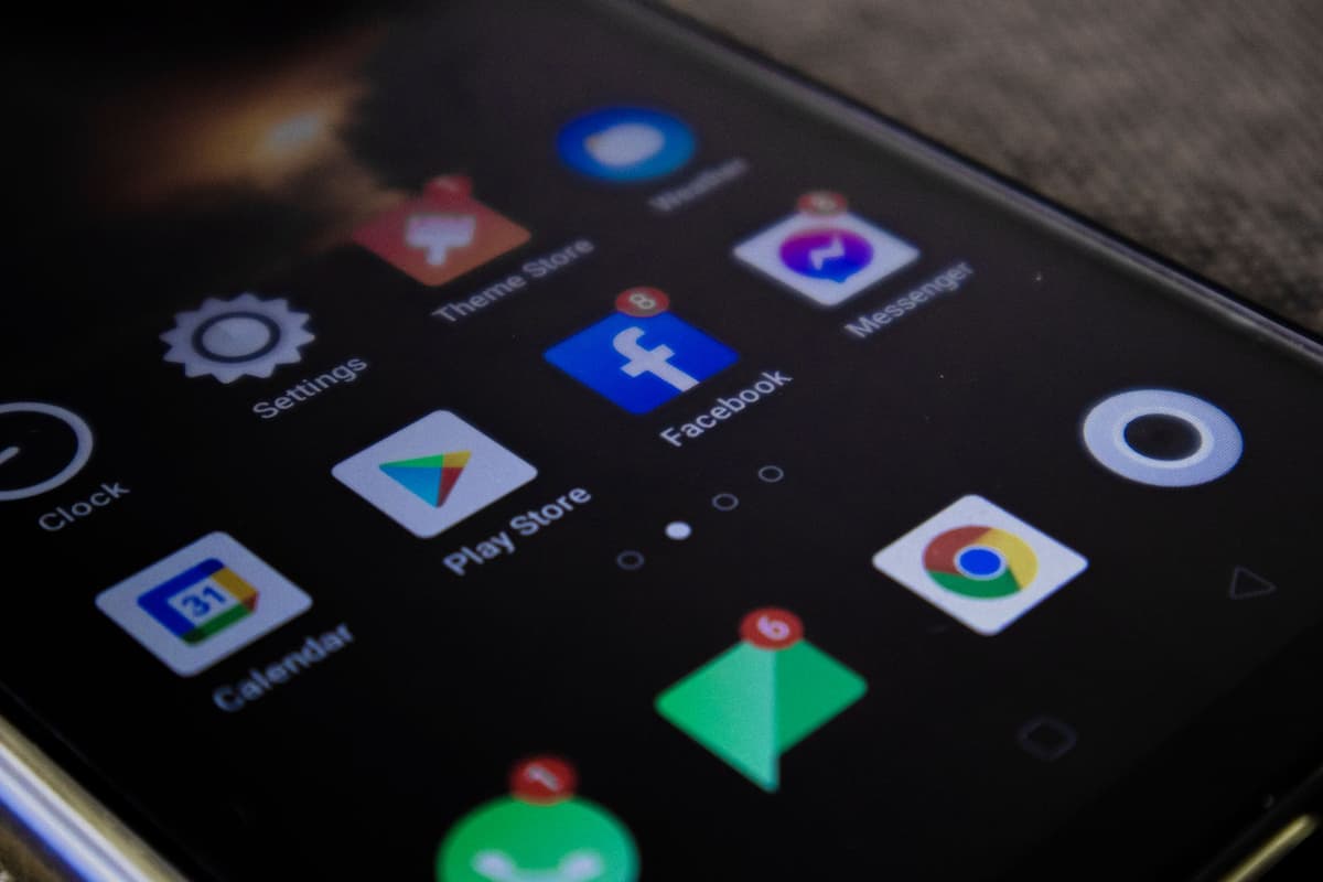 a smartphone screen displaying predatory loan offers disguised as colorful notifications