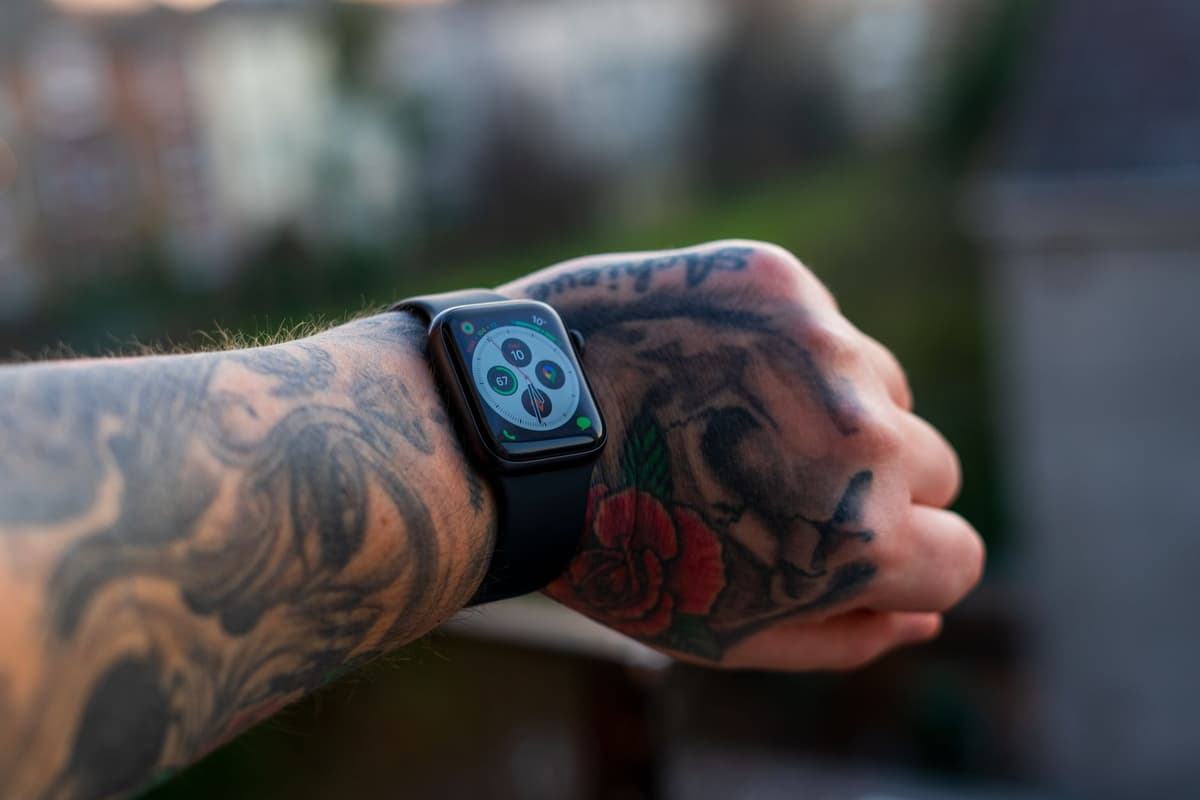a close up of a smartwatch displaying a blood oxygen graph on a wrist