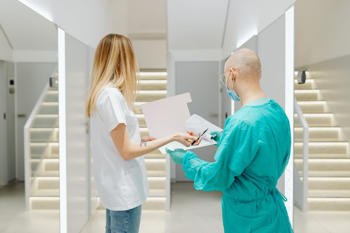 a sterile hospital corridor with identical closed doors
