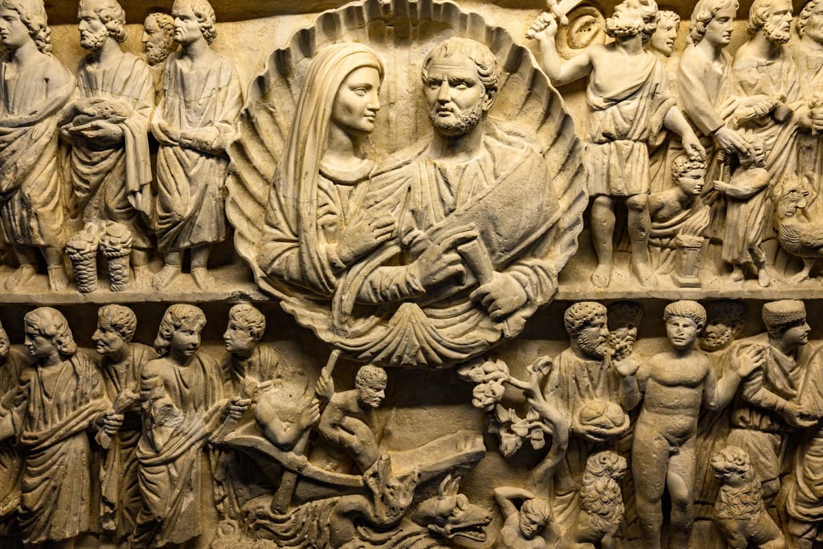 a dusty limestone sarcophagus lid slightly ajar