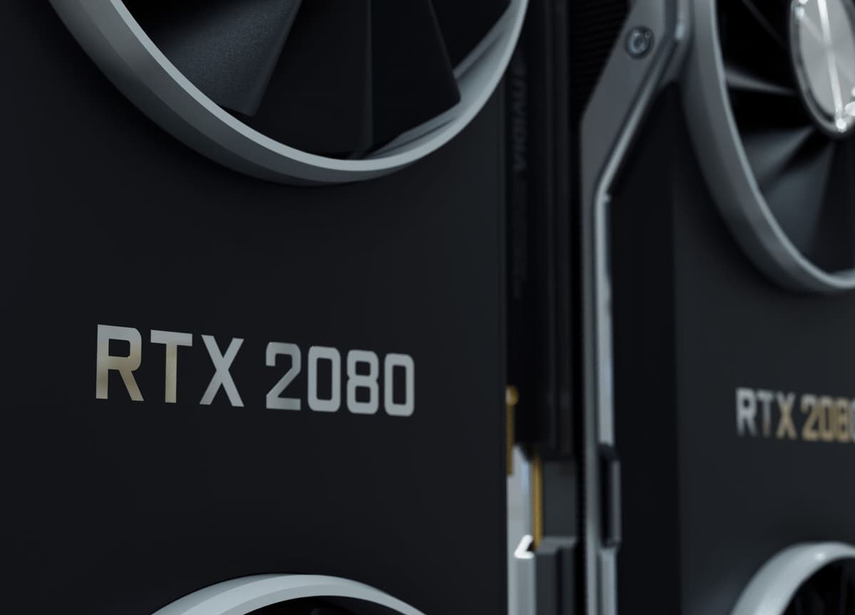 a sleek modern graphics card sitting on a wooden desk