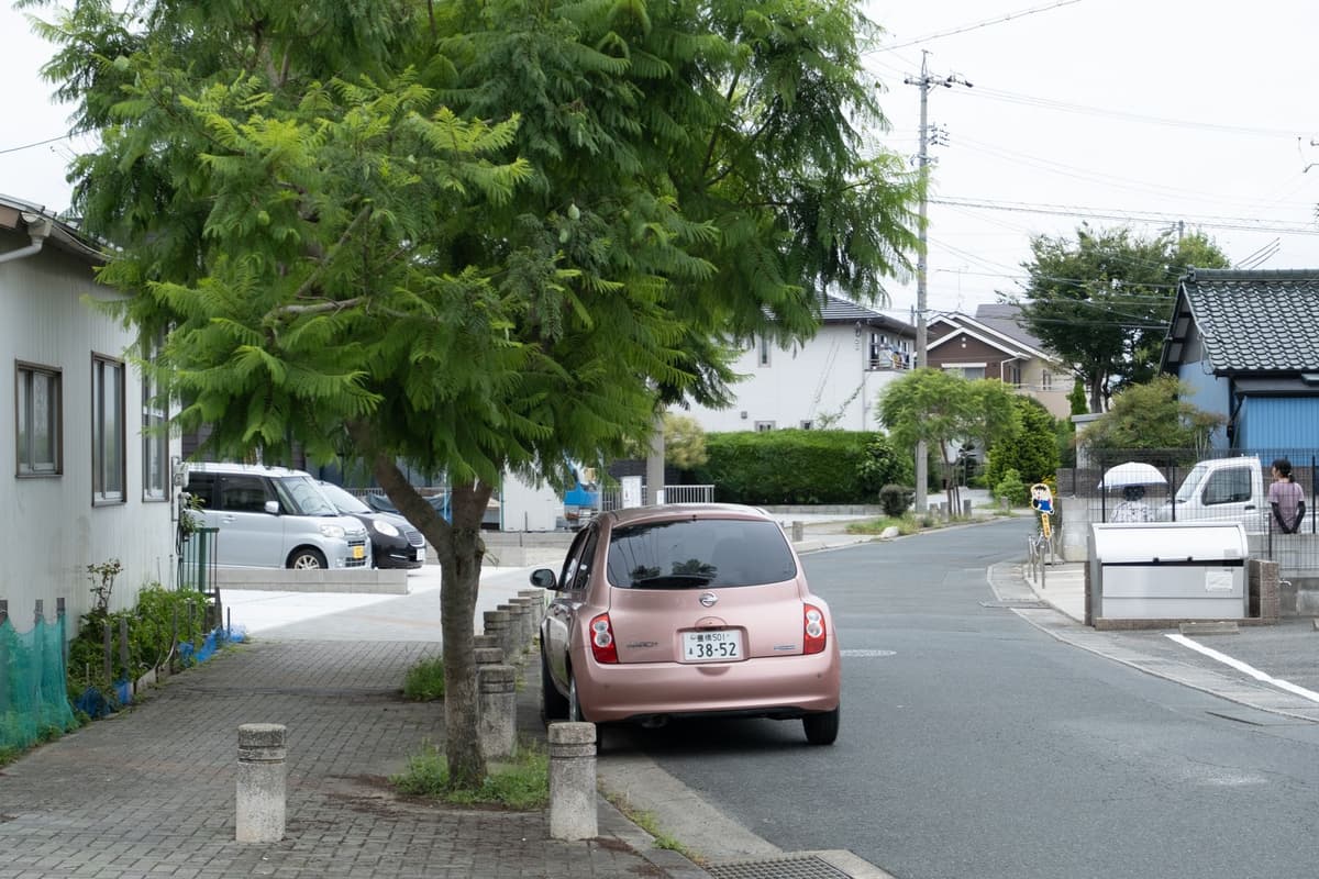 a digital doorbell camera showing a suburban street