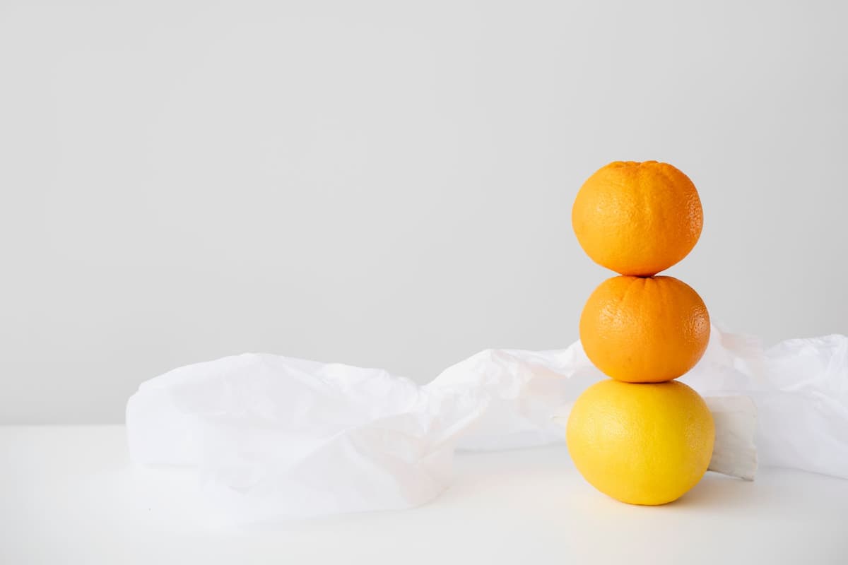 a pile of orange peels on a sterile white lab table