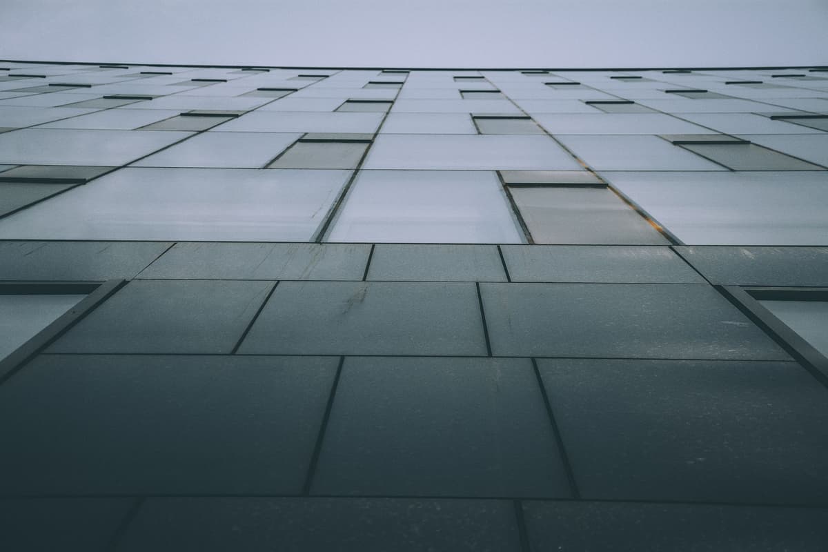 a bird's eye view of a patterned glass skyscraper