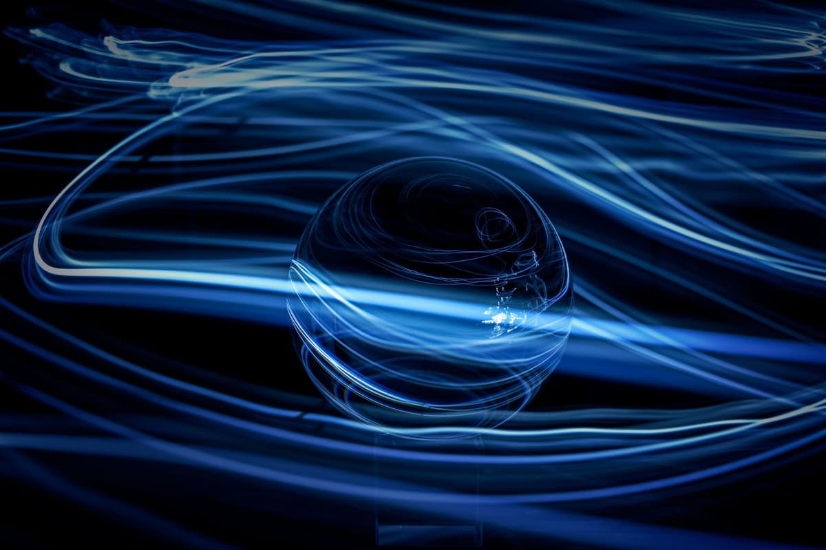a close-up of patterned glass with ultraviolet glow