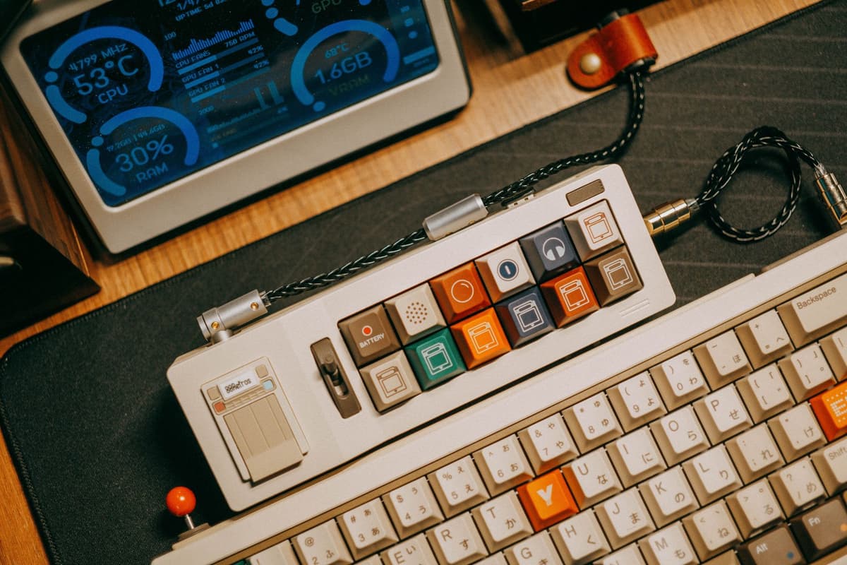 vintage red plastic mechanical toy computer on desk