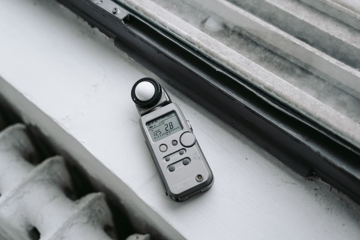 a heavy vintage IBM Simon resting on a concrete ledge