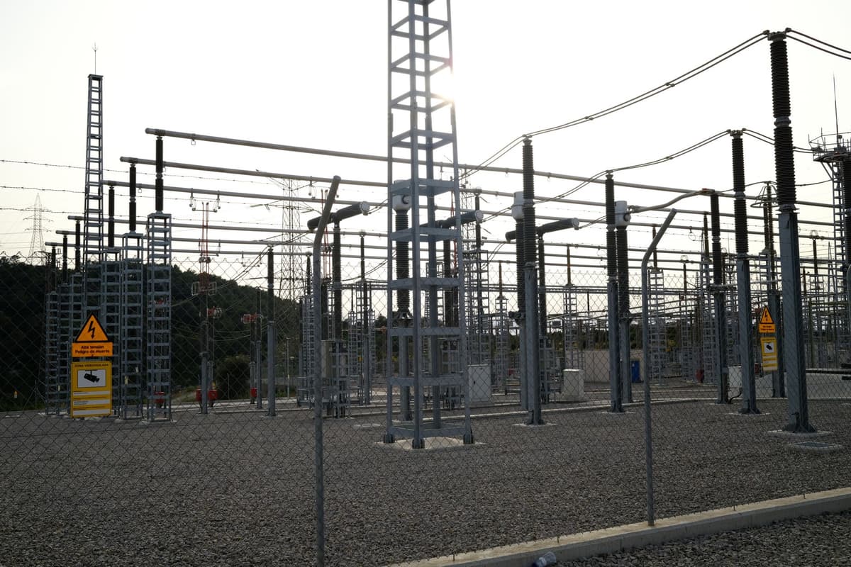 a high-voltage power substation at dusk