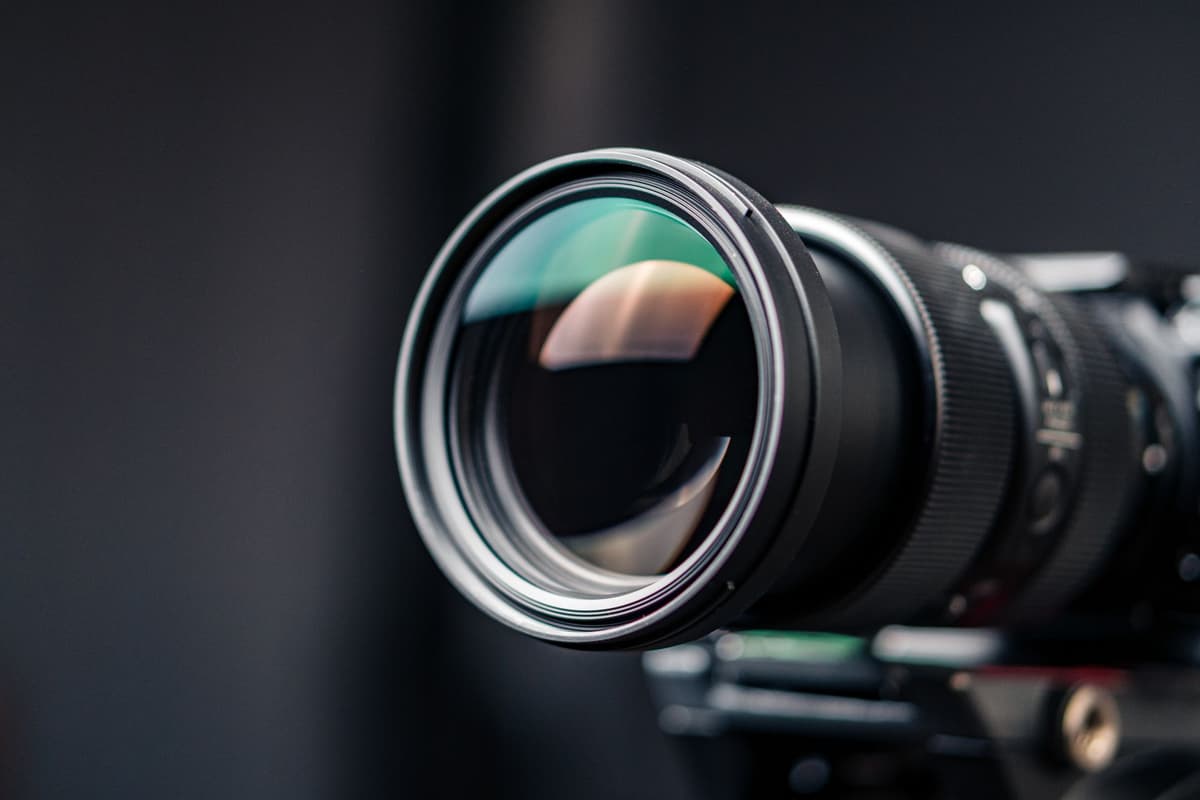 close up telephoto camera lens pointed at sea