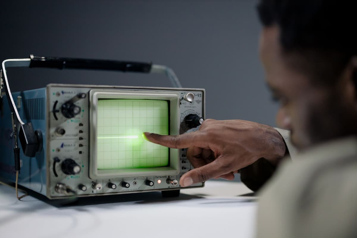 a researcher pointing at complex geometric projections