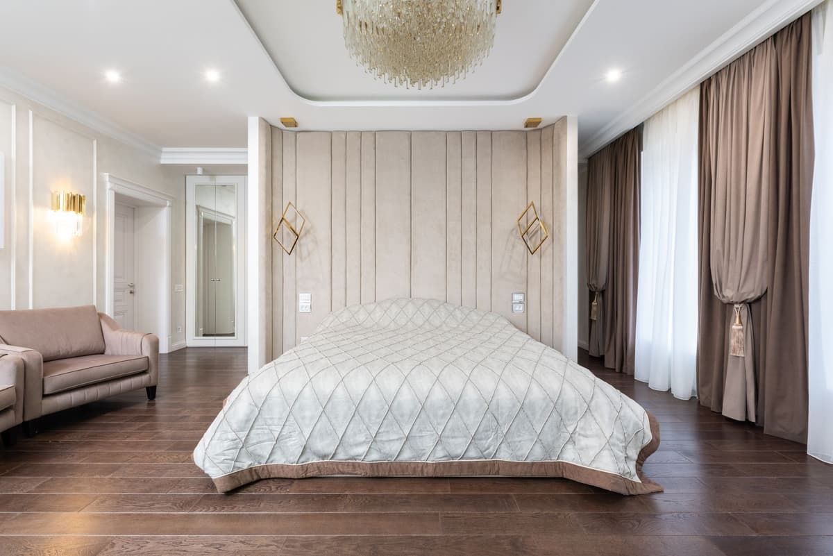 a minimalist bedroom with a very expensive smart bed