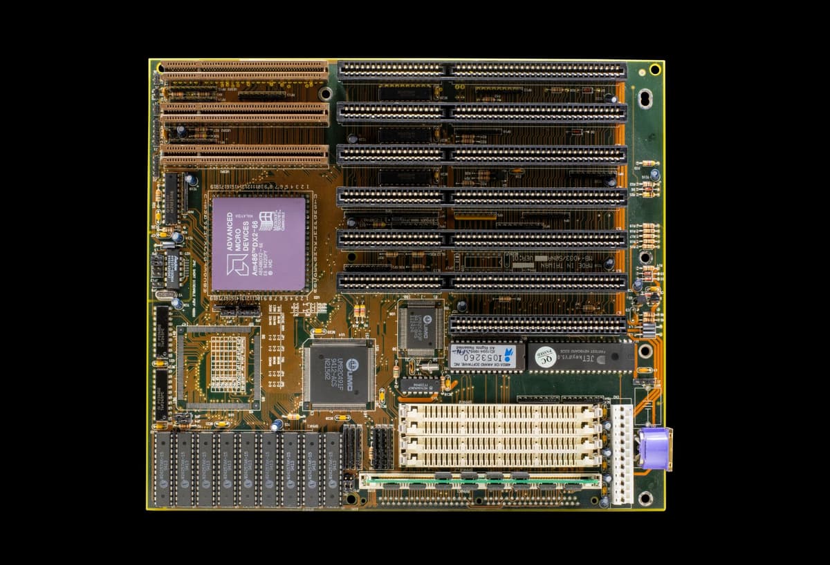 a dusty vintage circuit board with glowing blue traces