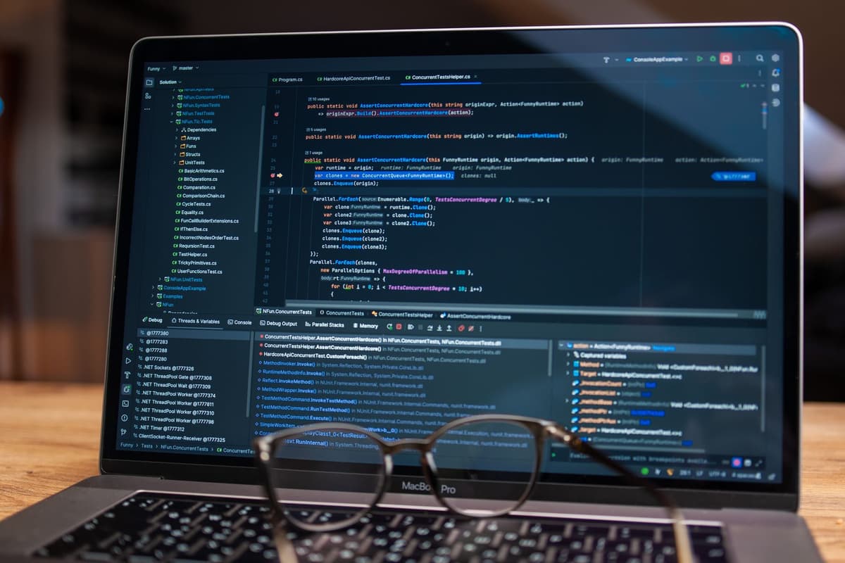 a magnifying glass hovering over lines of computer code