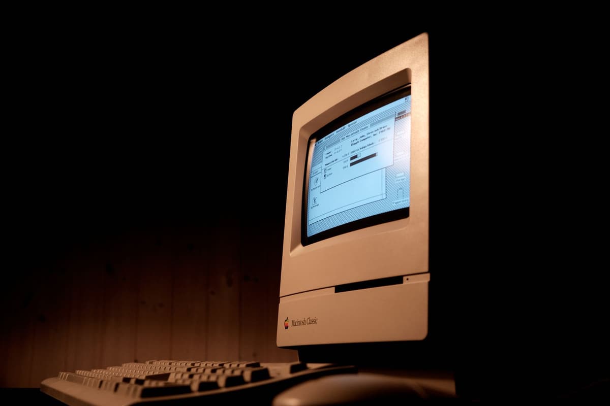 vintage spinning loading wheel on dusty computer monitor