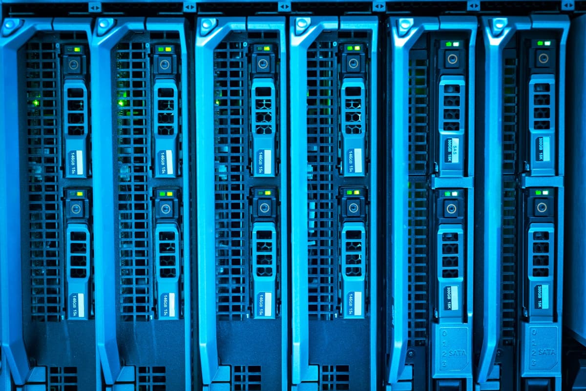 a single dusty server rack wearing a tiny balaclava