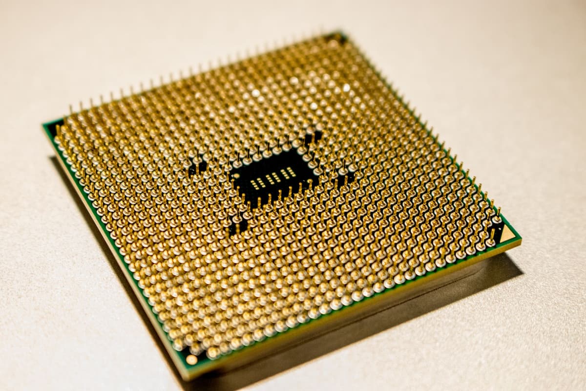 macro photo of a gold-plated vintage silicon chip die
