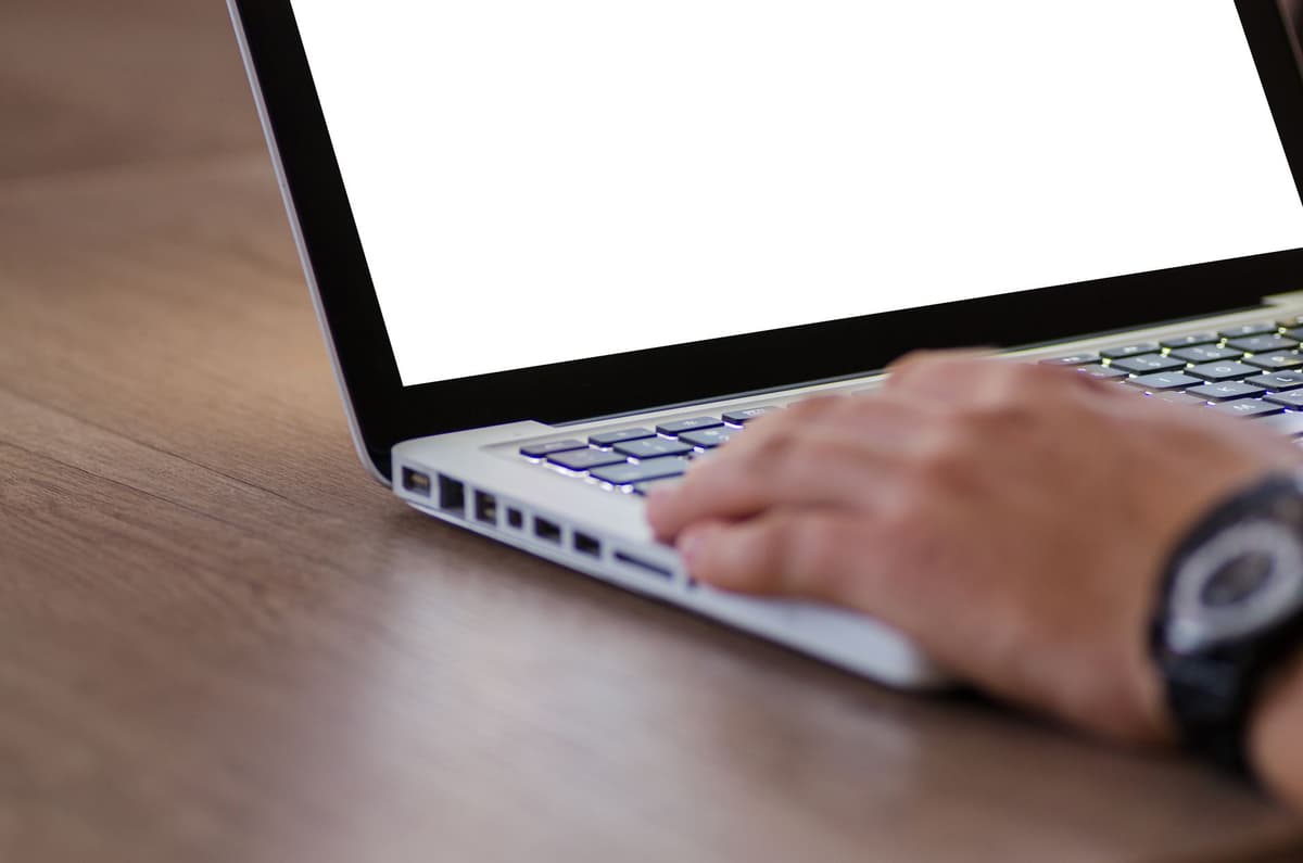a dusty rubber stamp hitting a blank digital screen