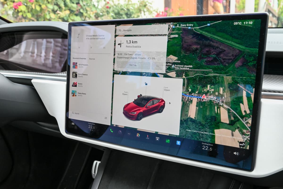 a dusty tablet screen inside a car dashboard showing a complex map