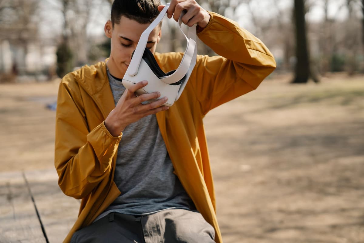 a futuristic park bench shaped like a giant white AirPod