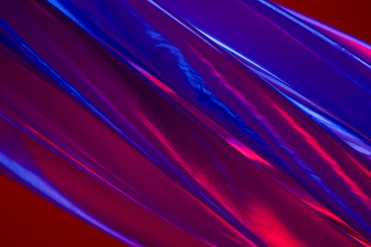 close-up macro photography of a bare silicon wafer die under blue laboratory light