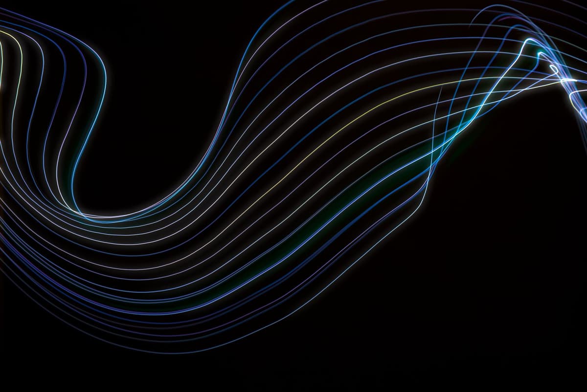 a futuristic microscope streaming neon data lines into a brain
