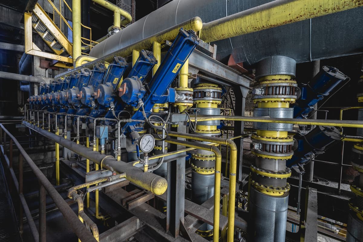 industrial pipe network connected to modern heating valves