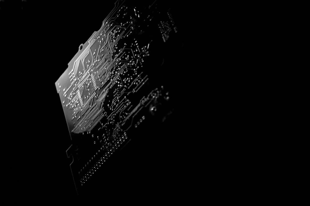 a microscopic view of a glowing silicon die
