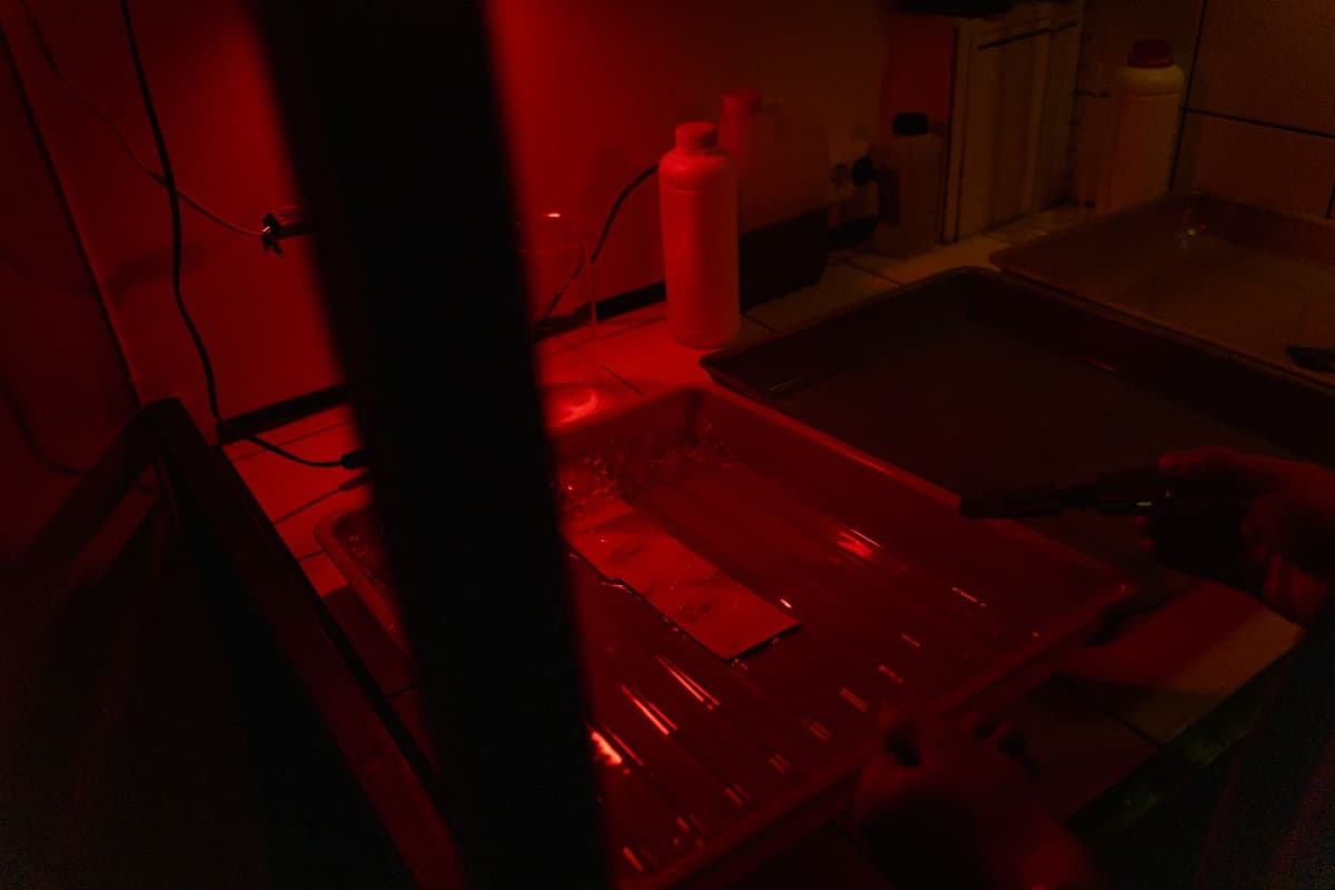 a single metallic chip glowing red on a dark lab table