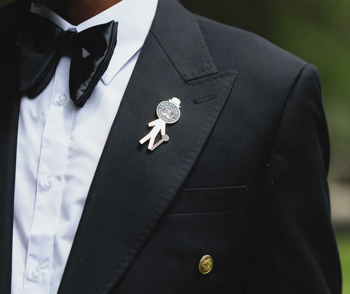 a mathematician wearing a tuxedo and monocle