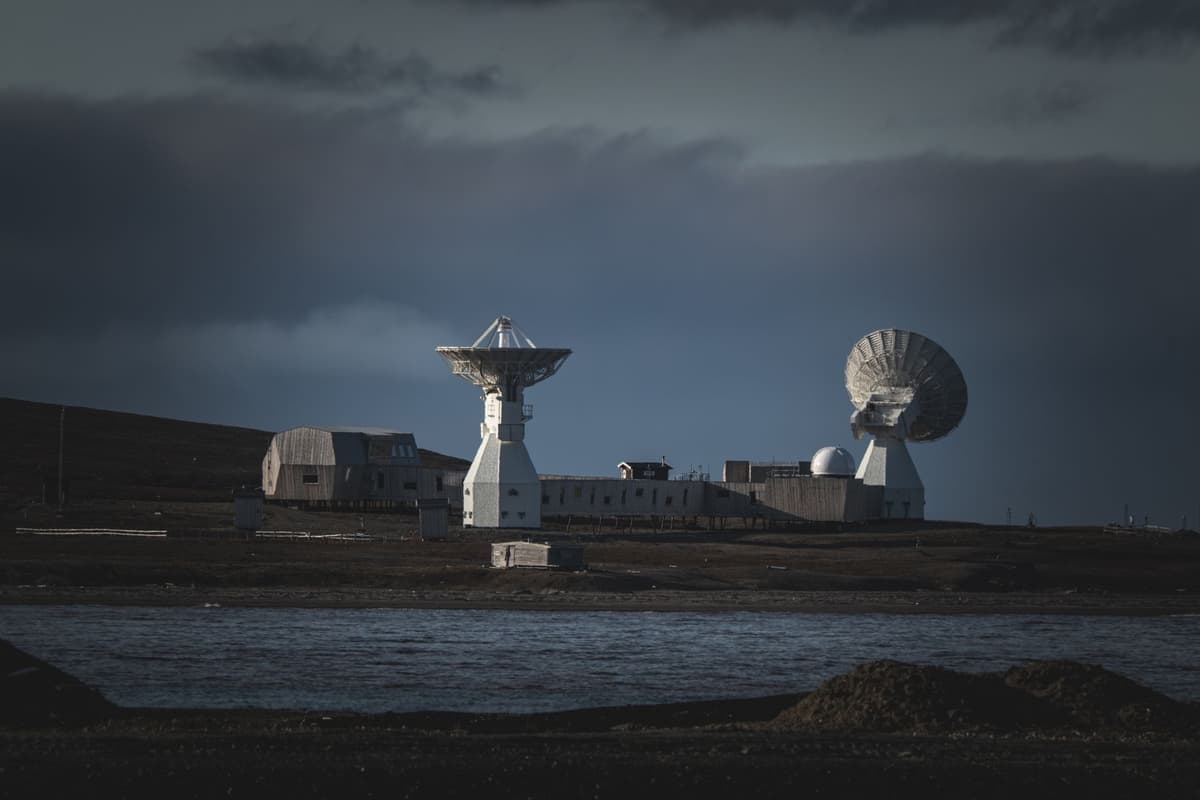 a high-tech satellite with a giant radiator fin