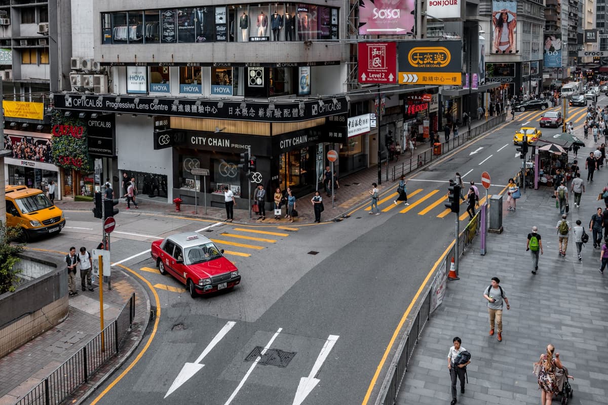 a crowded city sidewalk from a high angle