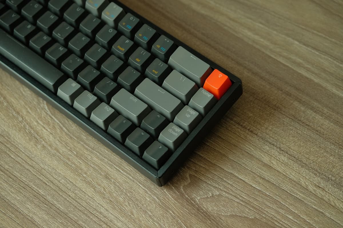 a single gray keyboard key labeled 'VERIFY' in a dark room