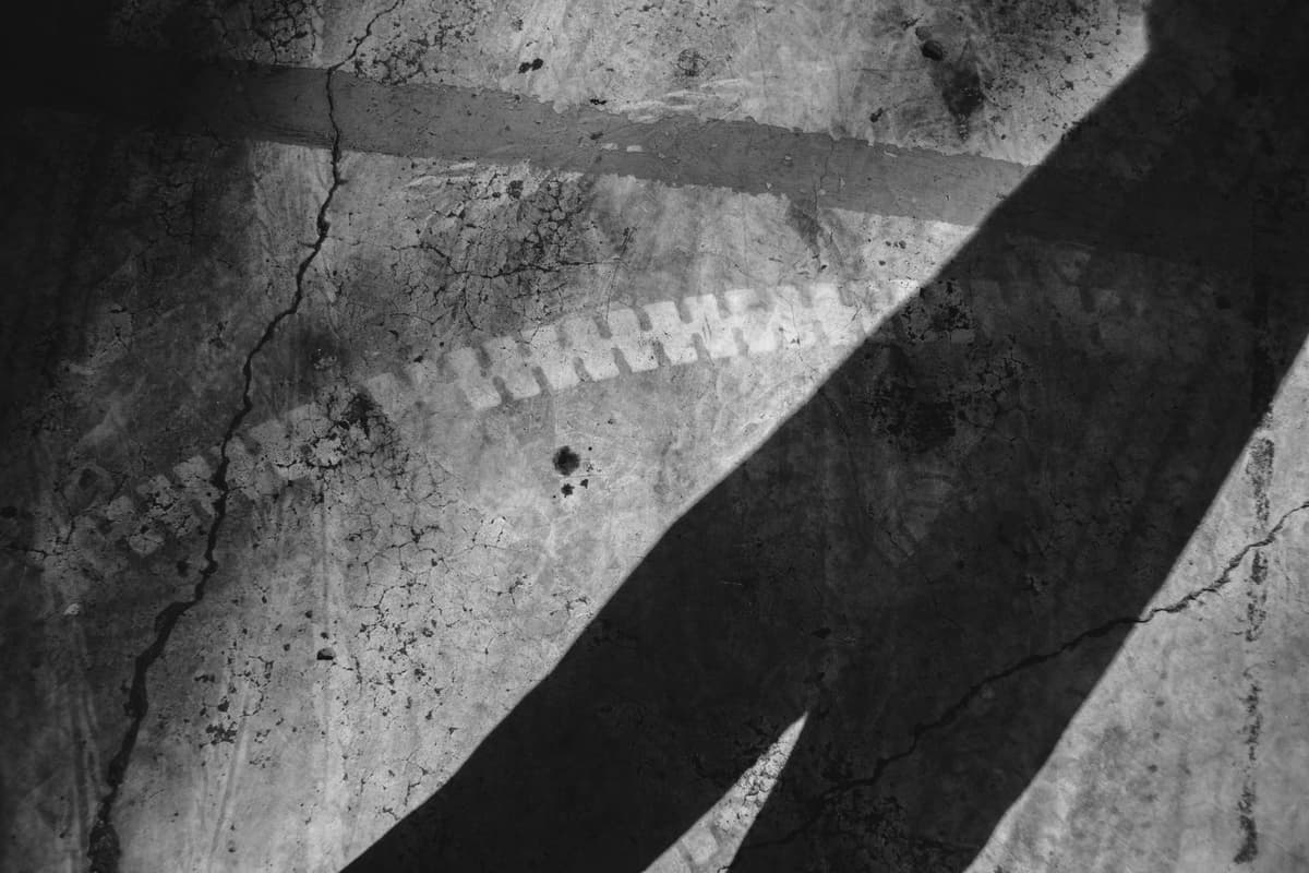 a dusty limestone floor with scattered bone fragments