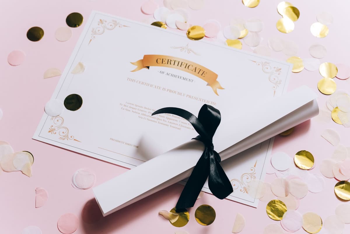 a formal government certificate in a simple wooden frame