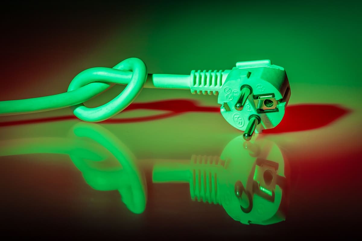 two tangled extension cords plugged into each other