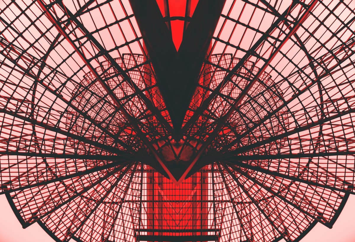 a metallic geometric structure orbiting a dim red star